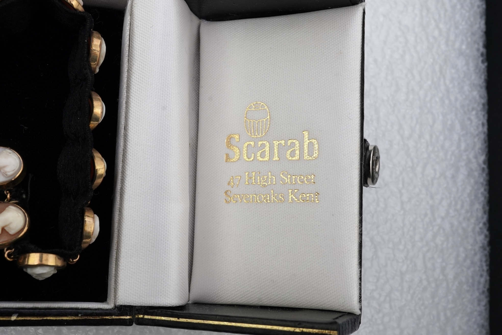 A pair of shell cameo earrings and bracelet, 19th century